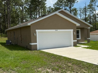 Beautiful New Construction in Citrus Springs - 4 Bedrooms on Citrus Springs Country Club in Florida - for sale on GolfHomes.com, golf home, golf lot