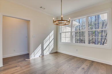 Located within the gated community of The Reserve at Woodside on The Reserve Club At Woodside Plantation in South Carolina - for sale on GolfHomes.com, golf home, golf lot