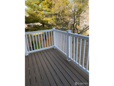 Airy, bright, and immaculate! This beautiful second (top) floor on Meadows At Middlesex in New Jersey - for sale on GolfHomes.com, golf home, golf lot