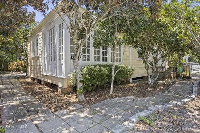 Step into the timeless charm of this beautifully preserved on Pass Christian Isles Golf Club in Mississippi - for sale on GolfHomes.com, golf home, golf lot
