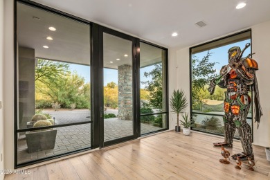 A striking example of contemporary design, this single-level on Desert Mountain Golf Club - Renegade Course in Arizona - for sale on GolfHomes.com, golf home, golf lot