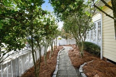 Step into the timeless charm of this beautifully preserved on Pass Christian Isles Golf Club in Mississippi - for sale on GolfHomes.com, golf home, golf lot