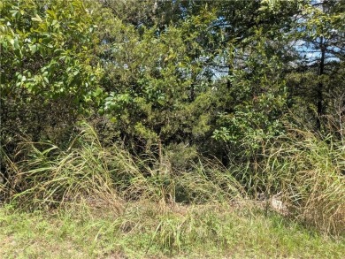 Ready to build your dream home? Quiet and gently wooded within a on Holiday Island Golf Course in Arkansas - for sale on GolfHomes.com, golf home, golf lot