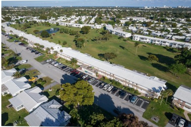 Pompano Beach 2 BR/1 BA with gorgeous views of Private Par 3 on Leisureville Community Association in Florida - for sale on GolfHomes.com, golf home, golf lot
