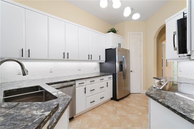 RARELY AVAILABLE COACH HOME WITH GOLF COURSE VIEWS IN THE on Vineyards Golf and Country Club in Florida - for sale on GolfHomes.com, golf home, golf lot