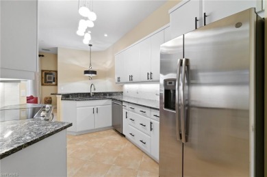 RARELY AVAILABLE COACH HOME WITH GOLF COURSE VIEWS IN THE on Vineyards Golf and Country Club in Florida - for sale on GolfHomes.com, golf home, golf lot
