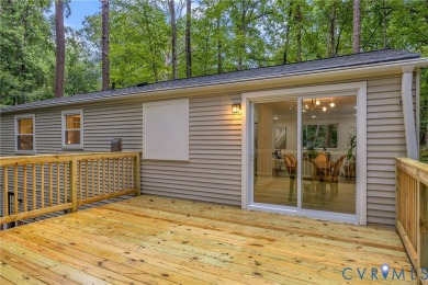We're thrilled to present this stunning, top-to-bottom renovated on Brandermill Country Club in Virginia - for sale on GolfHomes.com, golf home, golf lot