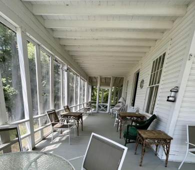 Be transported to another era in this heritage Whitehall cottage on White Lake Golf Club in Michigan - for sale on GolfHomes.com, golf home, golf lot