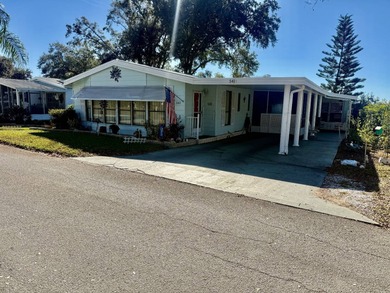 Home is located in Water Oak Country Club Estates, an active 55 on Water Oak Country Club Estates in Florida - for sale on GolfHomes.com, golf home, golf lot