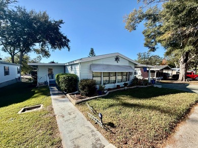 Home is located in Water Oak Country Club Estates, an active 55 on Water Oak Country Club Estates in Florida - for sale on GolfHomes.com, golf home, golf lot
