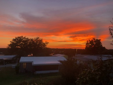 Home is located in Water Oak Country Club Estates, an active 55 on Water Oak Country Club Estates in Florida - for sale on GolfHomes.com, golf home, golf lot