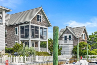 Coastal charm on one of the island's most iconic corners. At the on Bald Head Island Golf Club in North Carolina - for sale on GolfHomes.com, golf home, golf lot