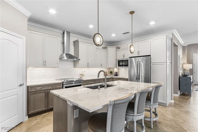 What a beauty! This home has it all. Incredible water, golf on Pelican Preserve Golf Club in Florida - for sale on GolfHomes.com, golf home, golf lot