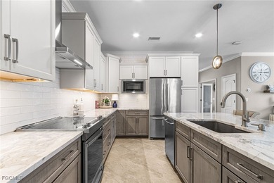 What a beauty! This home has it all. Incredible water, golf on Pelican Preserve Golf Club in Florida - for sale on GolfHomes.com, golf home, golf lot