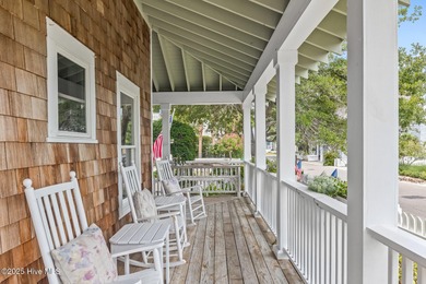 Coastal charm on one of the island's most iconic corners. At the on Bald Head Island Golf Club in North Carolina - for sale on GolfHomes.com, golf home, golf lot