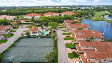 Enjoy breathtaking panoramic lake and golf course views of on Windstar on Naples Bay in Florida - for sale on GolfHomes.com, golf home, golf lot