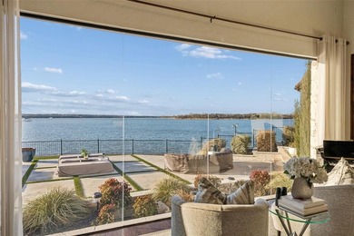 Poised on the open waters of Gated Resort on Eagle Mountain Lake on The Golf Club at Resort Eagle Mountain Lake in Texas - for sale on GolfHomes.com, golf home, golf lot