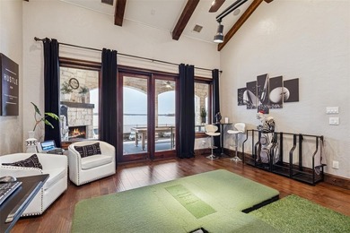 Poised on the open waters of Gated Resort on Eagle Mountain Lake on The Golf Club at Resort Eagle Mountain Lake in Texas - for sale on GolfHomes.com, golf home, golf lot