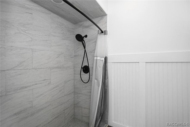 Updated and freshly painted cottage style home with 2 nice size on Sugarmill Woods Golf and Country Club in Florida - for sale on GolfHomes.com, golf home, golf lot