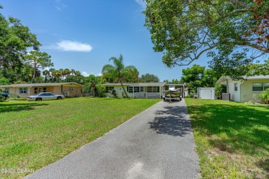 Living in paradise that is conveniently located to everything on New Smyrna Beach Golf Course in Florida - for sale on GolfHomes.com, golf home, golf lot