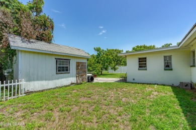 Living in paradise that is conveniently located to everything on New Smyrna Beach Golf Course in Florida - for sale on GolfHomes.com, golf home, golf lot