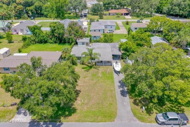 Living in paradise that is conveniently located to everything on New Smyrna Beach Golf Course in Florida - for sale on GolfHomes.com, golf home, golf lot