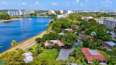 Newly Listed - Lakefront villa with over 1,800 SQ. FT. under air on Palm-Aire Country Club and Resort - Palms in Florida - for sale on GolfHomes.com, golf home, golf lot