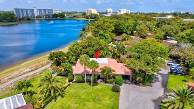 Must see LAKEFRONT villa with over 1,800 SQ. FT. under air on Palm-Aire Country Club and Resort - Palms in Florida - for sale on GolfHomes.com, golf home, golf lot