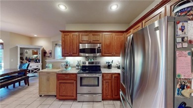 Luxury Living Near Lakes and Trails. Move-In Ready. Rich in on Bella Vista - Metfield Golf Complex and Country Club in Arkansas - for sale on GolfHomes.com, golf home, golf lot