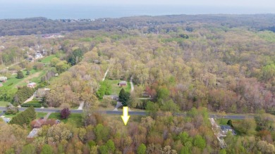 WOODED ONE ACRE Building Site offers an attractive canvas for on Whittaker Woods Golf Course in Michigan - for sale on GolfHomes.com, golf home, golf lot