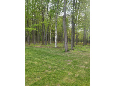 WOODED ONE ACRE Building Site offers an attractive canvas for on Whittaker Woods Golf Course in Michigan - for sale on GolfHomes.com, golf home, golf lot