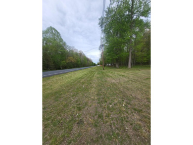 WOODED ONE ACRE Building Site offers an attractive canvas for on Whittaker Woods Golf Course in Michigan - for sale on GolfHomes.com, golf home, golf lot