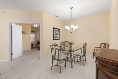 This first floor end unit condo with 1 car attached garage is on The Club At Grandezza in Florida - for sale on GolfHomes.com, golf home, golf lot