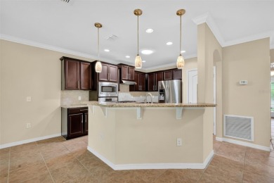 This 2 bed room 2 bath home with a den/study . Two solar lights on Arlington Ridge Golf Club in Florida - for sale on GolfHomes.com, golf home, golf lot