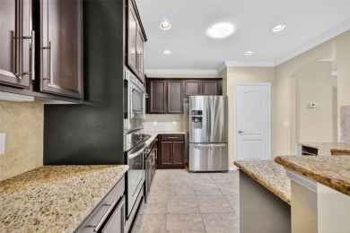 This 2 bed room 2 bath home with a den/study . Two solar lights on Arlington Ridge Golf Club in Florida - for sale on GolfHomes.com, golf home, golf lot