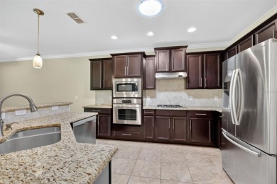 This 2 bed room 2 bath home with a den/study . Two solar lights on Arlington Ridge Golf Club in Florida - for sale on GolfHomes.com, golf home, golf lot