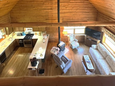 Charming Log Home on Corner Lot - Perfect Golf Course Retreat! on Lake Carroll Golf Course in Illinois - for sale on GolfHomes.com, golf home, golf lot