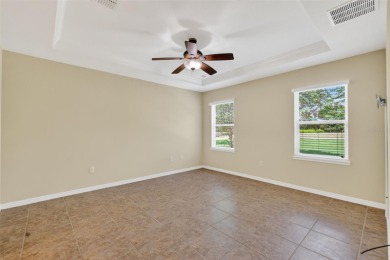 This 2 bed room 2 bath home with a den/study . Two solar lights on Arlington Ridge Golf Club in Florida - for sale on GolfHomes.com, golf home, golf lot