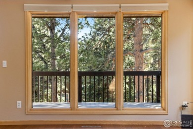 Welcome home to this meticulously maintained townhome, offering on Estes Park Golf Course in Colorado - for sale on GolfHomes.com, golf home, golf lot