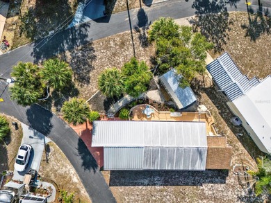 Discover the charm of Camp-A-Wyle, a highly desirable community on Glen Lakes Country Club in Florida - for sale on GolfHomes.com, golf home, golf lot