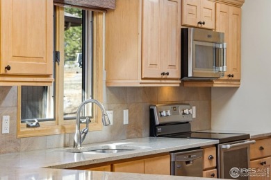 Welcome home to this meticulously maintained townhome, offering on Estes Park Golf Course in Colorado - for sale on GolfHomes.com, golf home, golf lot
