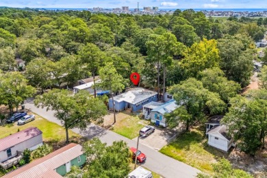 **** As IS****Affordable coastal living! This 3-bedroom, 2-bath on Tidewater Golf Club and Plantation in South Carolina - for sale on GolfHomes.com, golf home, golf lot