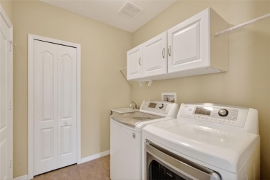 This 2 bed room 2 bath home with a den/study . Two solar lights on Arlington Ridge Golf Club in Florida - for sale on GolfHomes.com, golf home, golf lot