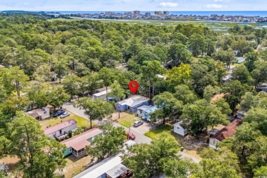 **** As IS****Affordable coastal living! This 3-bedroom, 2-bath on Tidewater Golf Club and Plantation in South Carolina - for sale on GolfHomes.com, golf home, golf lot