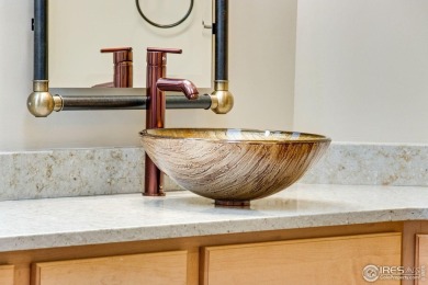 Welcome home to this meticulously maintained townhome, offering on Estes Park Golf Course in Colorado - for sale on GolfHomes.com, golf home, golf lot