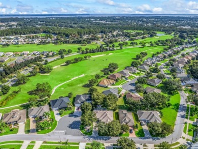 This 2 bed room 2 bath home with a den/study . Two solar lights on Arlington Ridge Golf Club in Florida - for sale on GolfHomes.com, golf home, golf lot