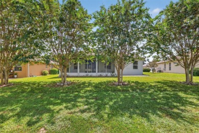 This 2 bed room 2 bath home with a den/study . Two solar lights on Arlington Ridge Golf Club in Florida - for sale on GolfHomes.com, golf home, golf lot