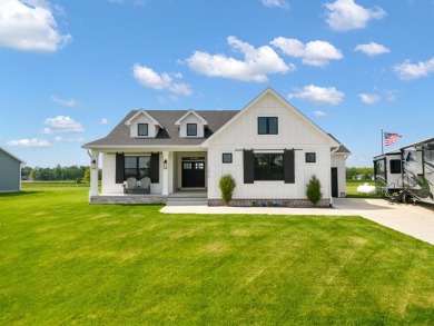 This home is a hole in one! Just off hole #1 on Honey Creek Golf on Honey Creek Golf Club in Iowa - for sale on GolfHomes.com, golf home, golf lot
