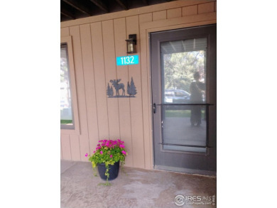 Welcome home to this meticulously maintained townhome, offering on Estes Park Golf Course in Colorado - for sale on GolfHomes.com, golf home, golf lot