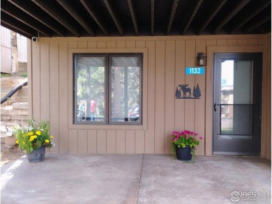 Welcome home to this meticulously maintained townhome, offering on Estes Park Golf Course in Colorado - for sale on GolfHomes.com, golf home, golf lot